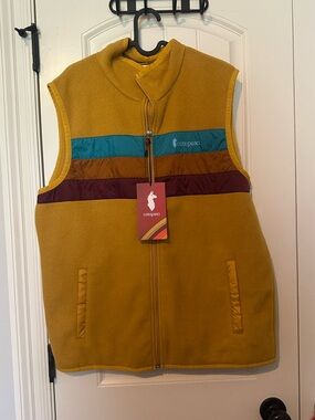 cotopaxi Mustard Yellow Fleece Vest with Teal, Rust, and Burgundy Stripes